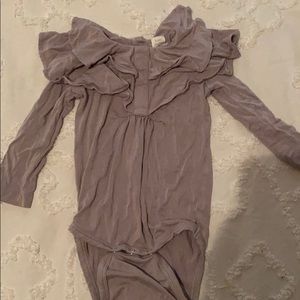 Kate Quinn purple one piece